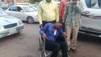 Ali al-Dali, the assaulted sudanes journalist, sitting in a wheel chair after the vicious attack