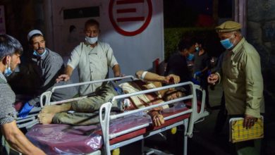 image showing a victim of the kabul bombing being brought in for treatment