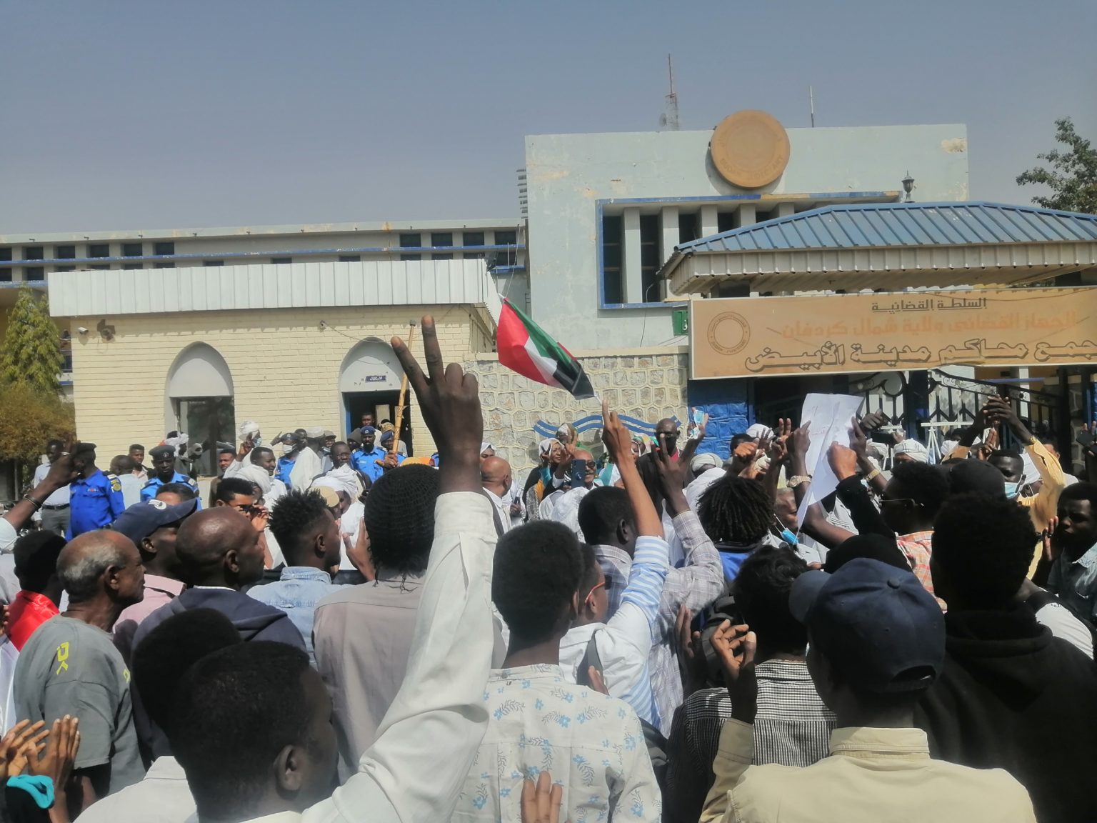 Crowds gathered outside the al-Ubayyid courts complex